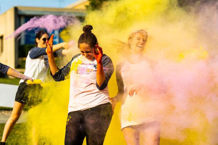 Student gets colored powder thrown on her during mental health color mile