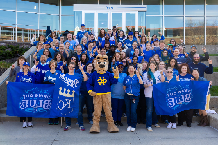 UMKC faculty and staff in Royals gear.