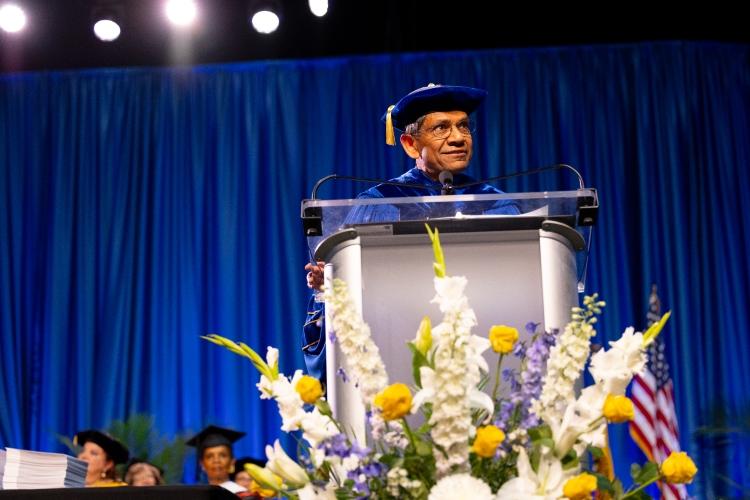Chancellor Agrawal speaking on stage at Commencement